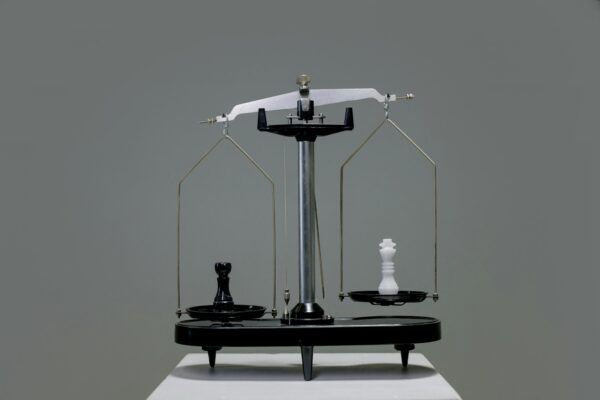 Chess balance scale comparison vs