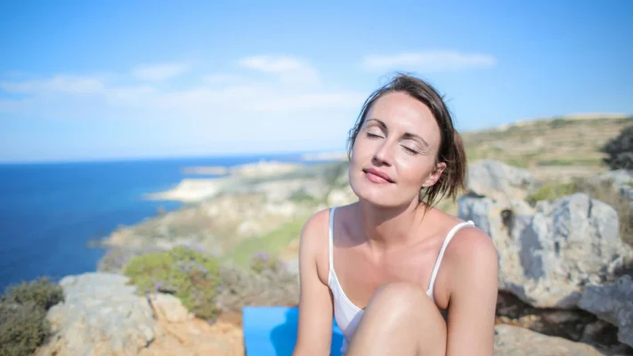 Attractive woman relaxing outdoors